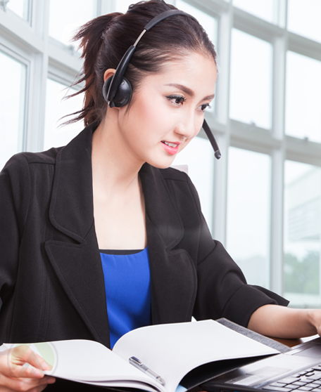 young-female-call-center-employee-at-work-with-opened-printed-document