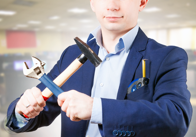 businessman-holding-tools