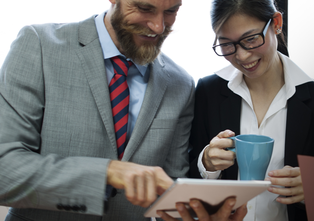 businessmen-mentoring-young-asian-employee-using-tablet