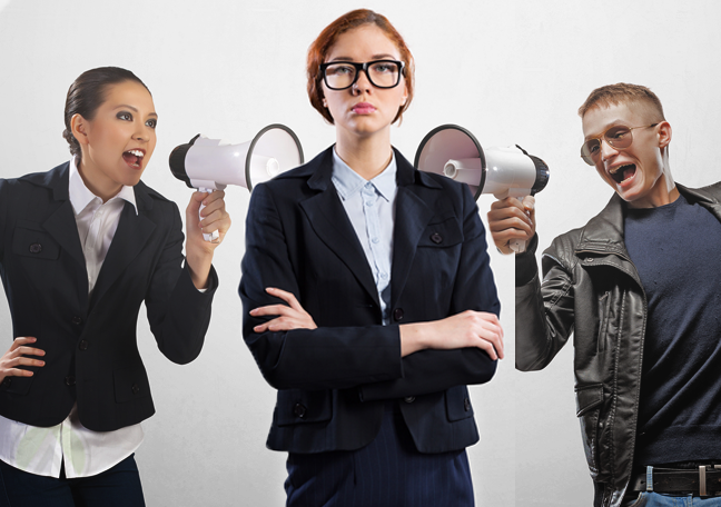 businesswoman-in-glasses-ignoring-people-with-megaphones