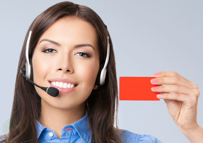 call-center-agent-holding-up-red-card