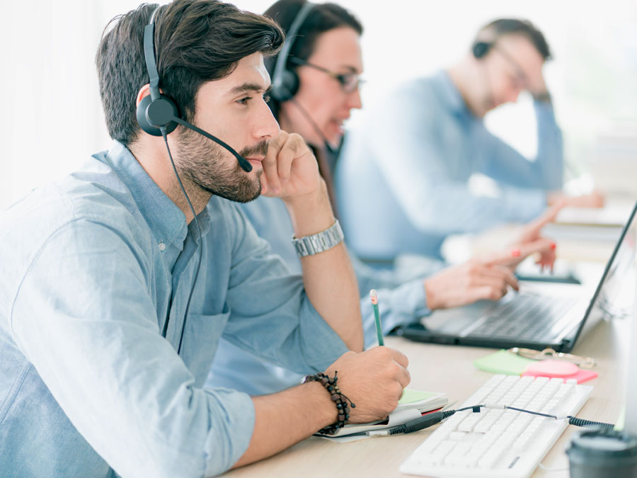 customer relationship management system benefits call center outsourcing cx team assisting consumers over the phone