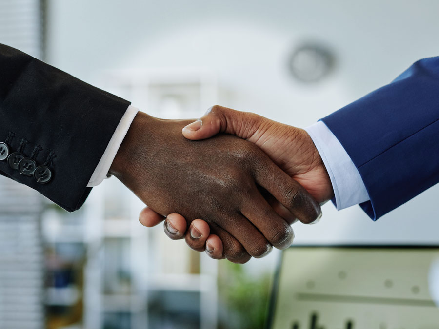 customer relationship management system benefits relevant Key Stakeholders shaking hands