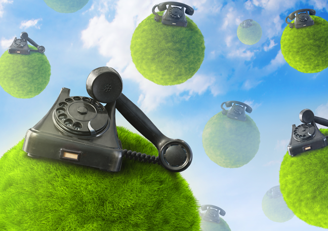 landline phone on small grassy planets