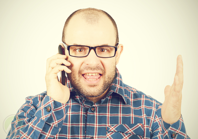 man-in-glasses-arguing-over-the-phone