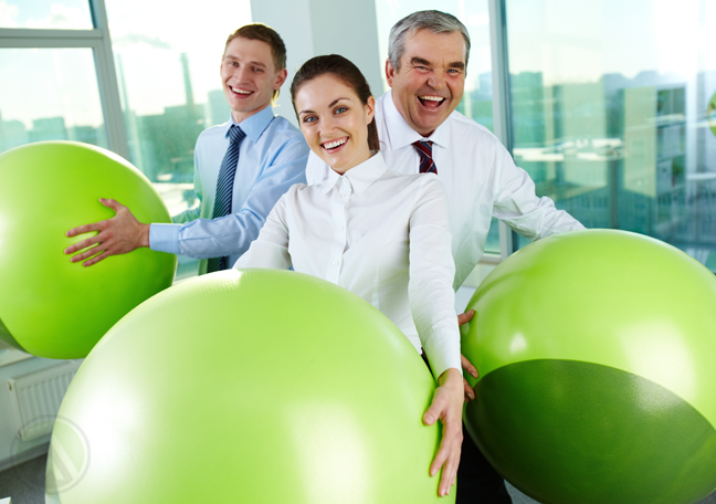office-workers-having-fun-with-exercise-balls