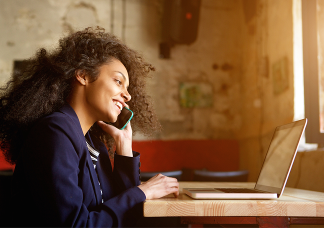 woman-in-phone-call-using-laptop