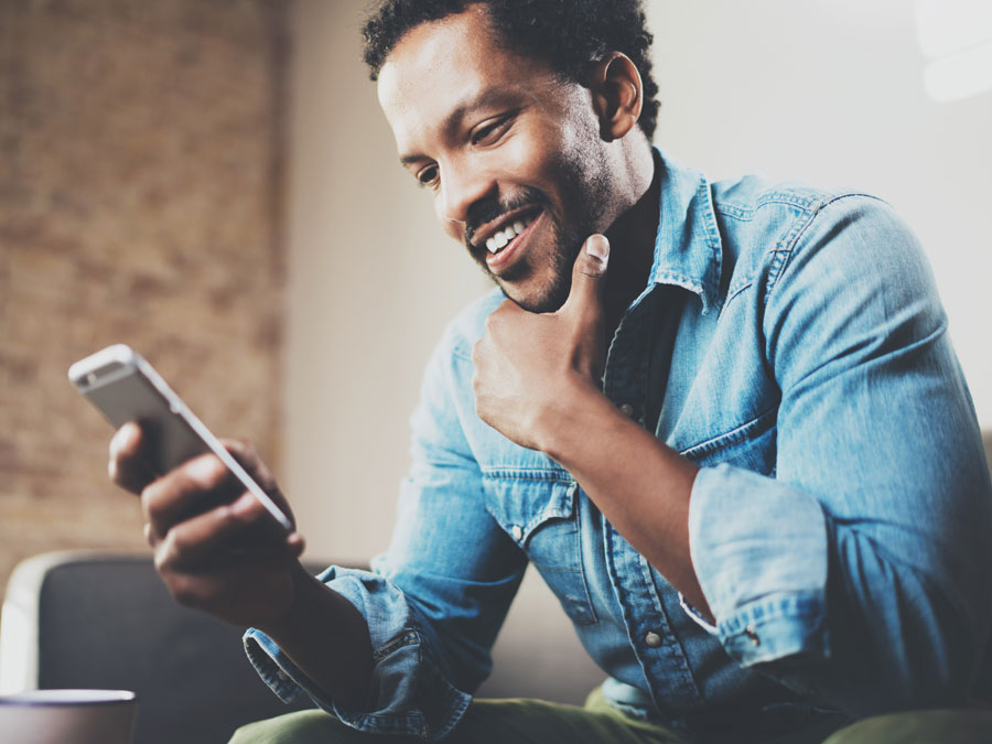 man making decisions using smartphone