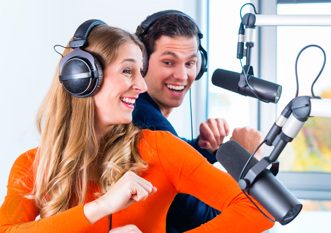 podcasts hosts having fun in recording booth