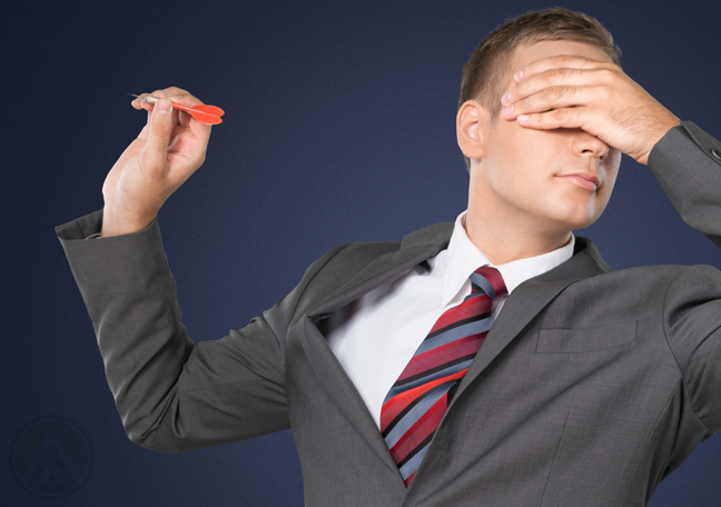 businessman playing darts covering eyes