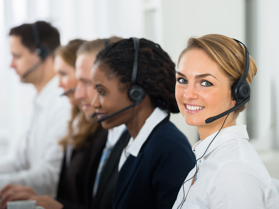 customer service agent with multilingual call center coworkers