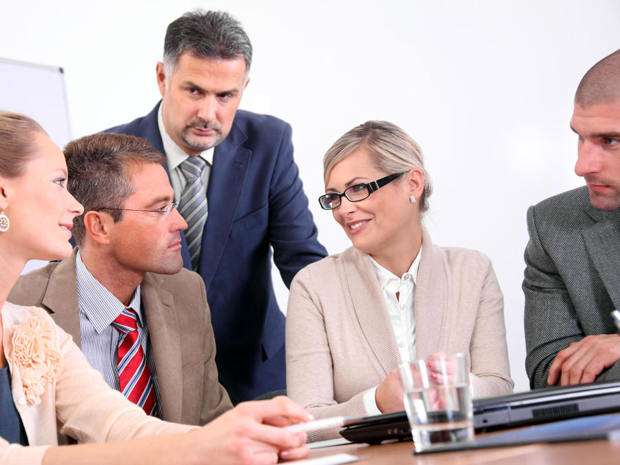 multilingual call center heads in a meeting