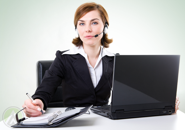 call center worker writing on planner