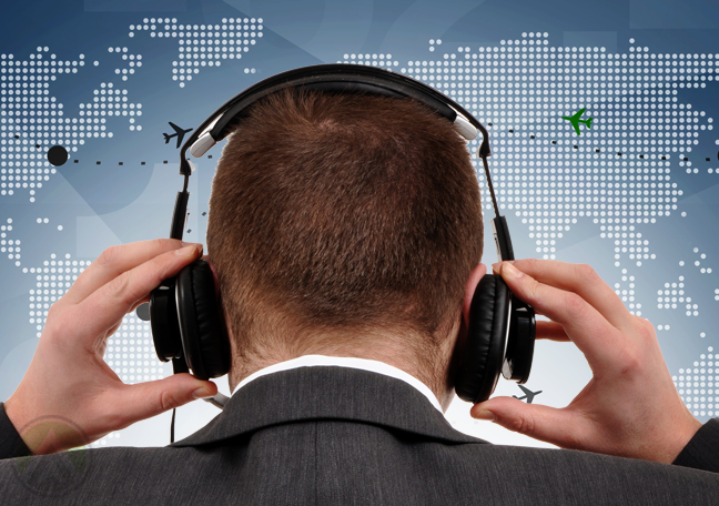 call center back behind holding headset looking at world map
