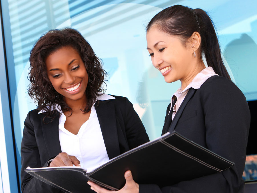 diverse call center coworkers comparing notes