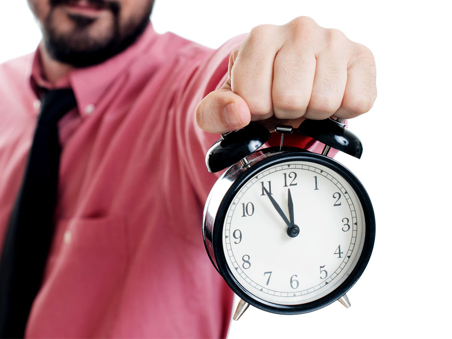 email support agent holding out alarm clock