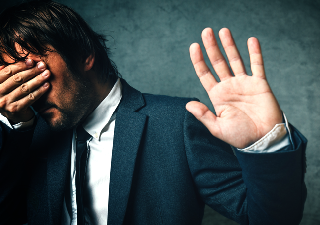 embarrassed businessman shamed