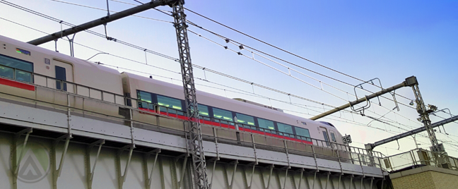 electric train running on high tracks