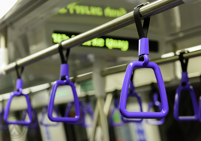 purple handle on electric train handrail