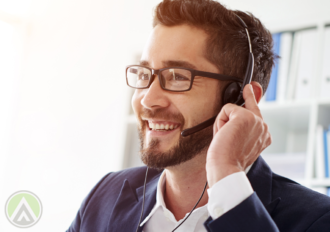 smiling call center agent in bear glasses