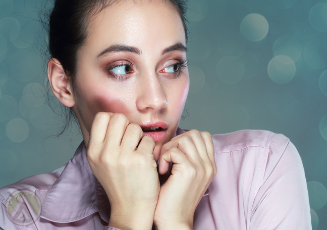 shy female employee looking off panel