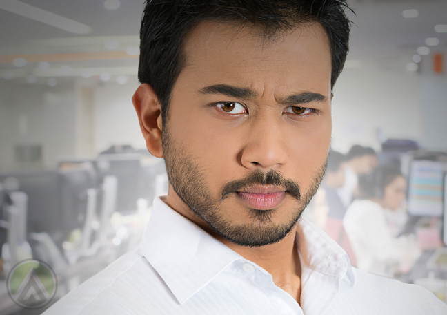 smug looking employee raised eyebrow