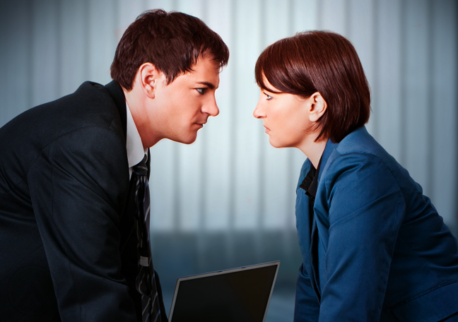 angry office coworkers in a stare down