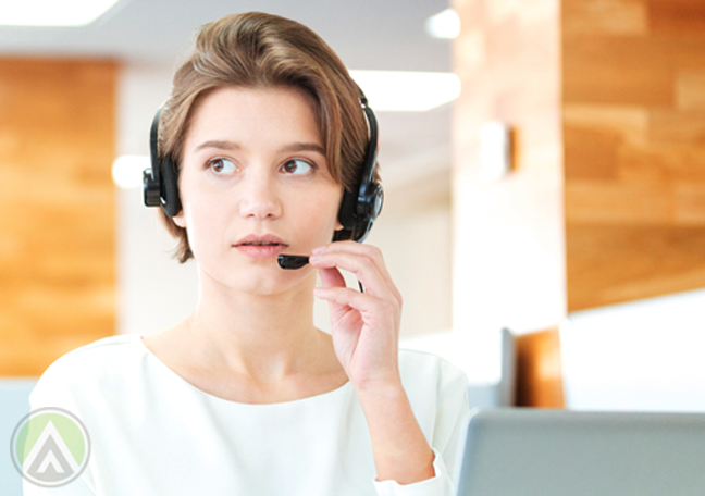 attentive call center agent listening to customer call