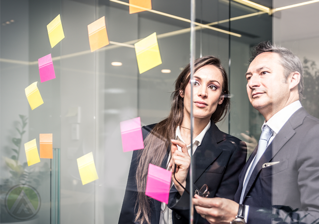 call center manager assistant looking at colorful post it notes