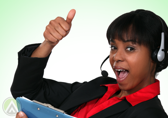 excited call center representative giving thumbs up