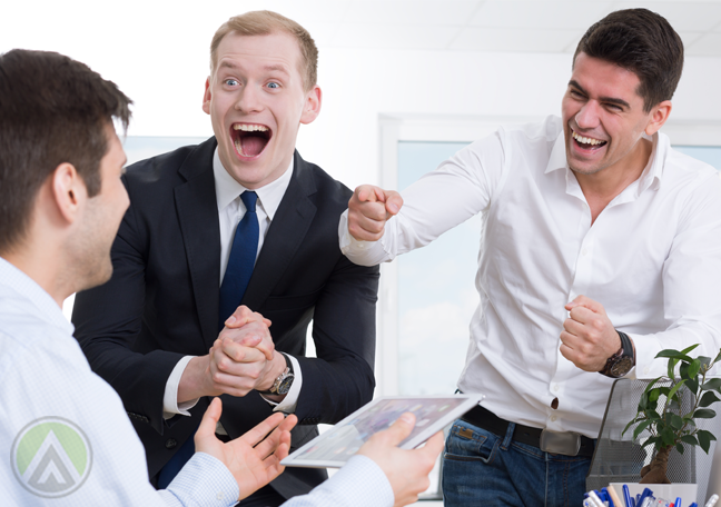 overjoyed businessman having fun with coworkers