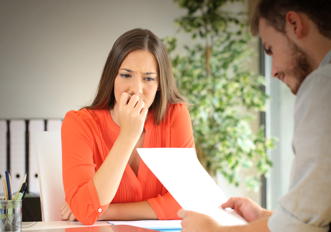 worried business executive in meeting 