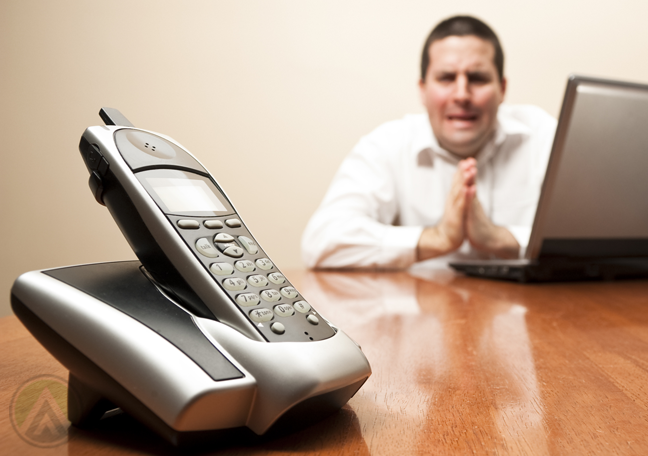 worried man waiting for phone call