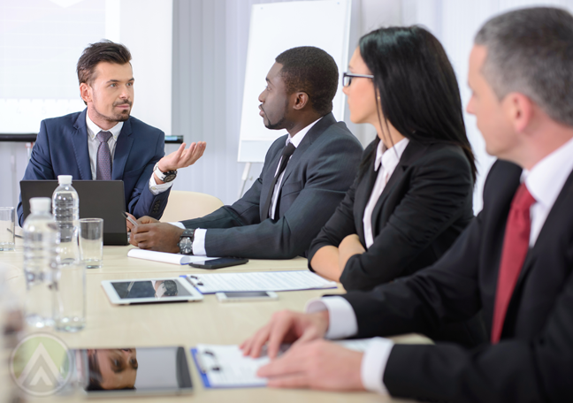 business team in meeting discussion lead by boss