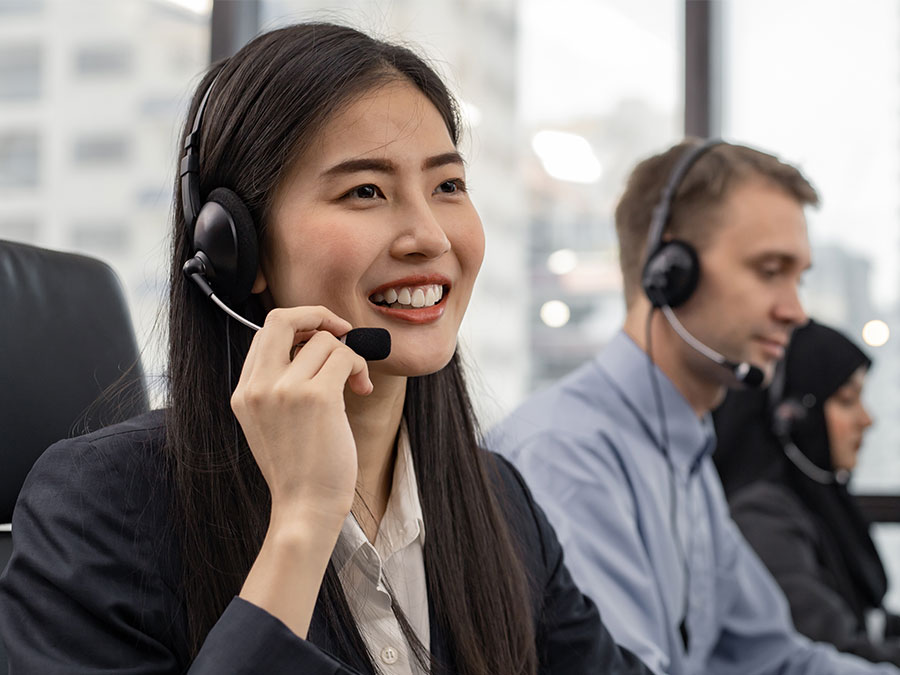 diverse call center representatives providing multilingual customer experience to global markets