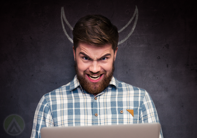 evil laughing man with laptop chalk drawn devil horns