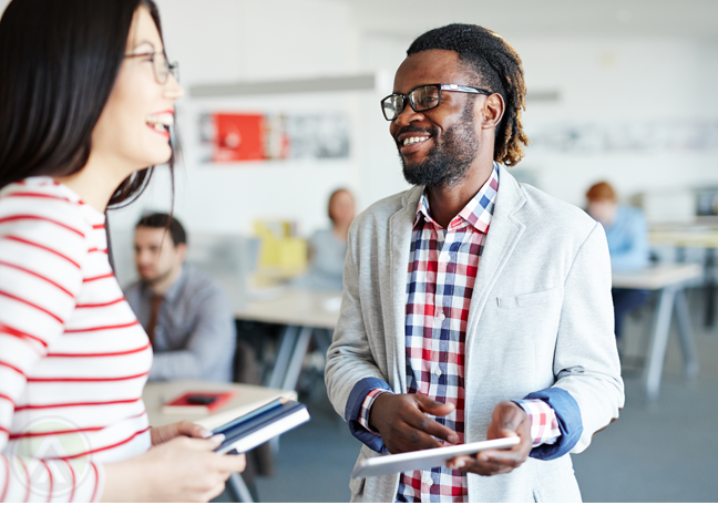 call center team manager chatting laughing with customer service employee