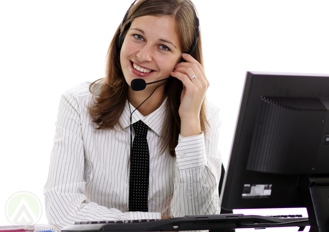 delighted customer service rep making call to client