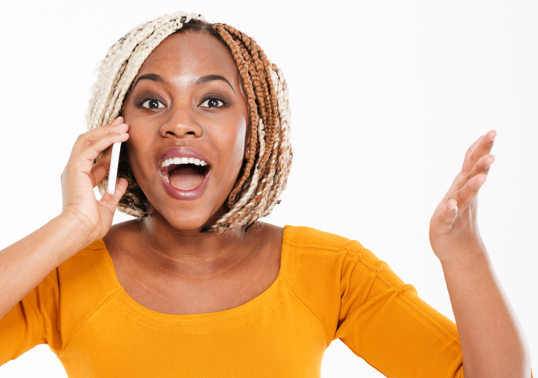 excited customer talking to call center representative on the phone