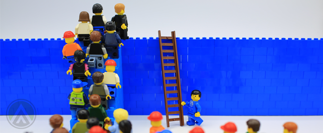 lego minifigs climing ladder over tall blue fence