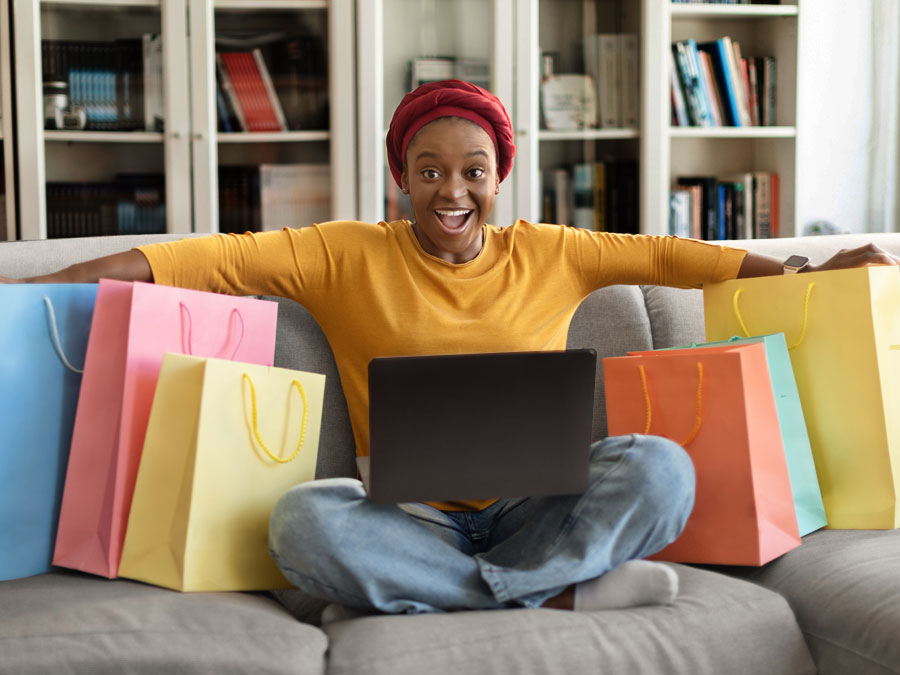 amazing customer experience shown on excited ecommerce consumer with shopping bags