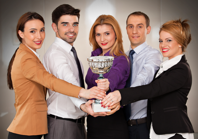 proud office team holding one trophy