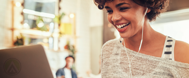 smiling woman using laptop