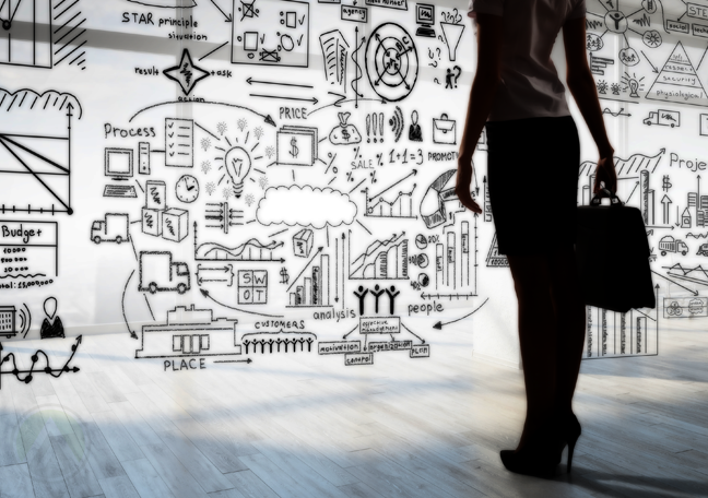 business woman holding bag standing in front of doodle showing data