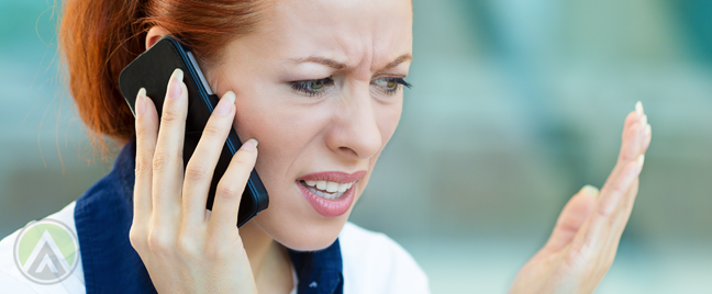 annoyed woman in phone call with customer service agent