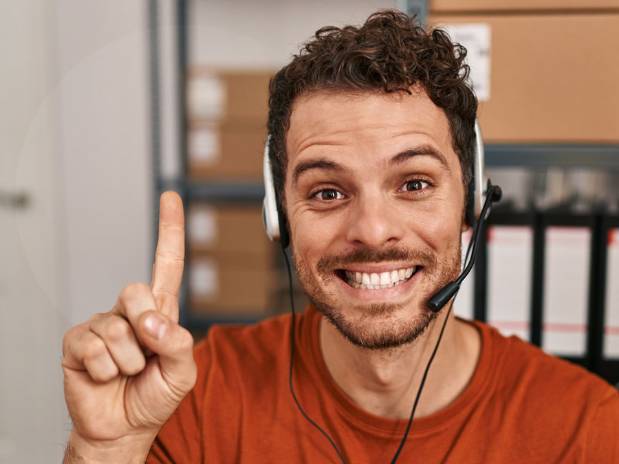 how to ask the right questions in a call center depiction CX agent finger in air 
