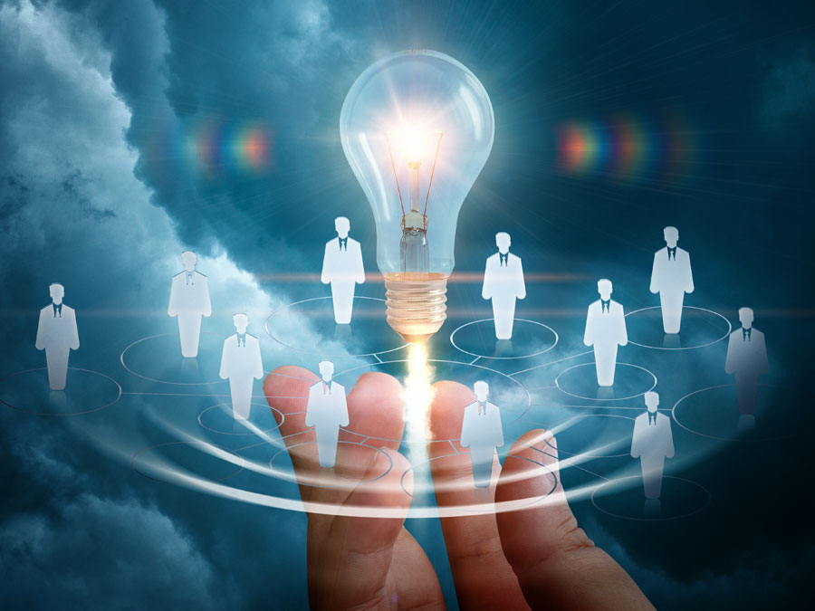 virtual recruitment employee group around lightbulb idea under hand