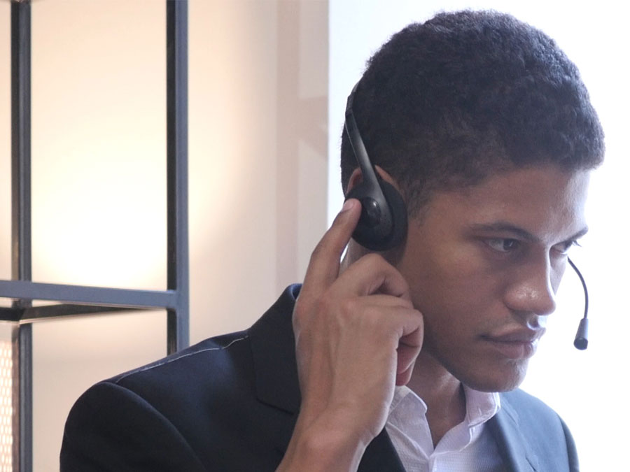 call center agent listening intently to customer over the phone