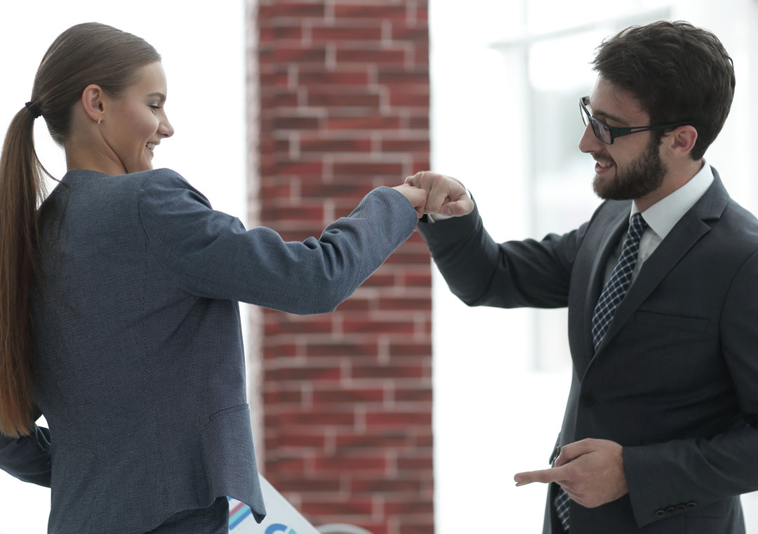 excited call center team leader motivating customer service agent