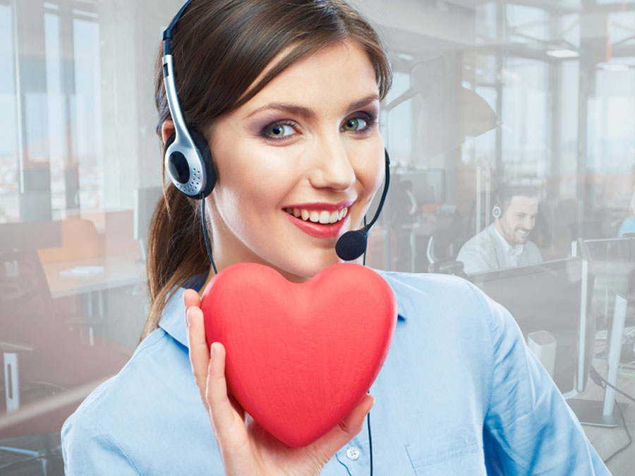 technical support agents with customer service depiction rep with heart in call center